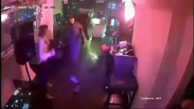 A man is hit by a petrol bomb preceding an armed robbery in a bar in Redcar, UK. Multiple CCTV angles.