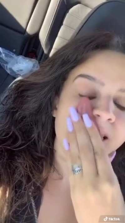 Tongue so long she can lick her own eyeball