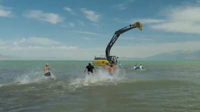 Swinging from a excavator that&rsquo;s speeding up and then abruptly stops isn&rsquo;t the brightest idea.