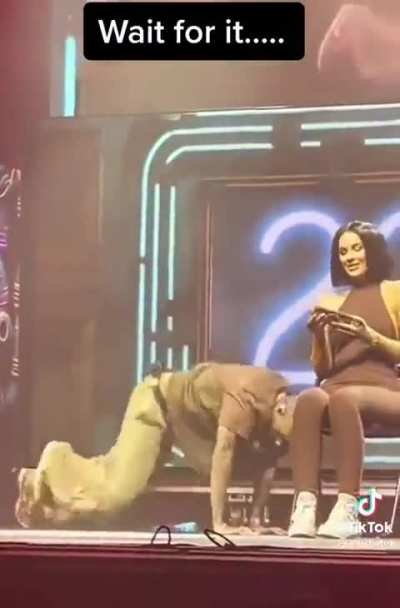 Chris Brown brought a fan on stage and she stayed on her phone&hellip; so he tossed it in the crowd