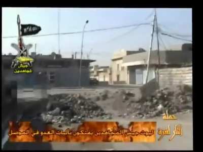 Jaish al-Mujahideen insurgents throw RKG-3 anti-tank grenade at a Humvee in Mosul (stabilized and trimmed off ~90% of intro, music added by source)