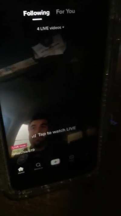 On duty police officer live streaming while driving.