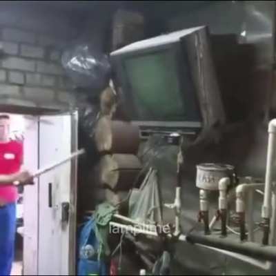 Engineer fixes a TV