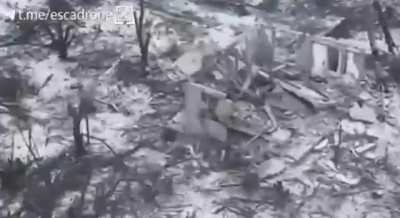 Ukrainian FPV drone blows open a building revealing the Russian soldier they were targeting