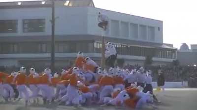 This is the Japanese Sport of "Boutaoshi" meaning "Bring the pole down"