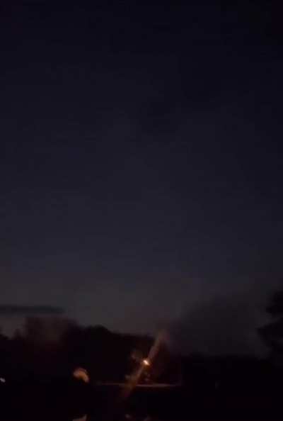 UFO with 3 orange lights seemingly teleporting through the sky.