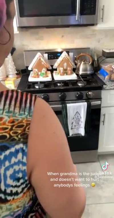 Grandma judging a gingerbread house contest