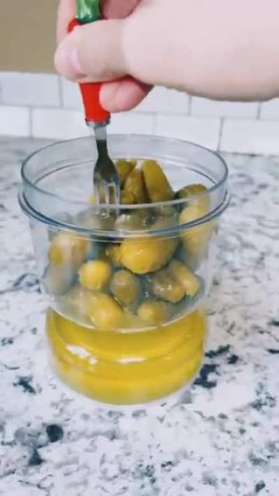 This special container allows you to seperate the pickle juice from the pickles for easier access.