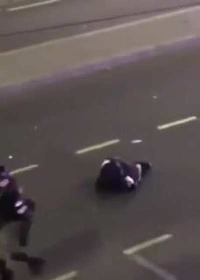 Police ganging on protestor, Serbia