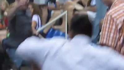 Brawl at US Open. Lady Slaps Young Guy, then Old Man Tackles.