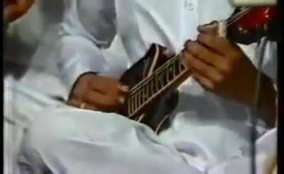 Young Uppalapu Srinivas (~age 11) playing Tyararaja Keertana Entha Muddo in Mandolin. He was child prodigy and his genius was compared with the likes of Beethoven,Mozzart Picasso,Newton