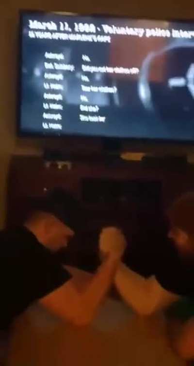 The classic arm wrestling snap.
