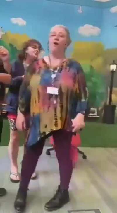 Anti-trans protesters storm library to shout hateful abuse during Drag Queen story hour.