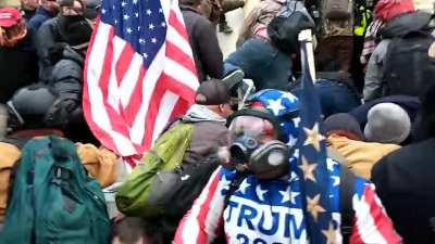 [Parler Leak] New CLOSE UP footage of men who were dragging and beating police officer with American flag at door to Capitol. "Fuck him up!"
