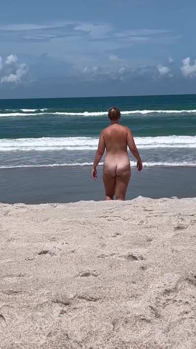 Walking into the ocean