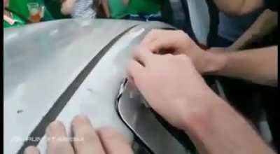 Irish Soccer Fans Fix Dented Car &amp;amp; squeeze money into the door of the car so the owner can pay for repairs.
