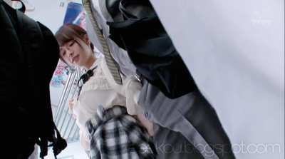 Pervert reaches into pants on Japanese subway