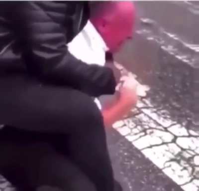 Policeman attempts an arrest