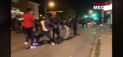 Peaceful Protesters breaking windows in Wauwatosa