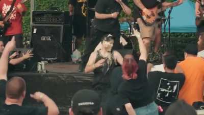 Drinking in a mosh pit