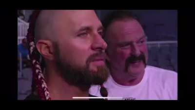 Lance Archer giving the finger to Moxley at Wrestlekingdom 14 skip forward to All Out Moxley returns the favour