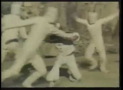Chinese Popeye from a fake Bruce Lee movie where he goes to Hell to fight Dracula, James Bond and a porn actress