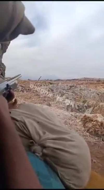 Idlib Syria, rebels using a shotgun to destroy a drone