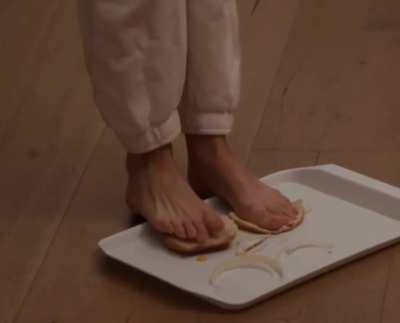 Pokimane stepping on burger buns - September 2021