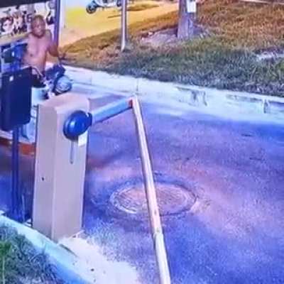man gets pissed and destroys a barrier ( I don't know where it's from)