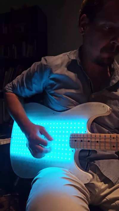 I made an ESP32-based guitar with 320 LEDs in the body