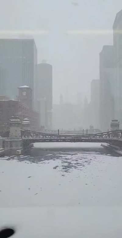 The River Frozen Over Viewed From The Brown Line