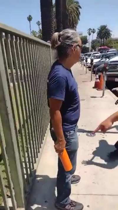 Asian man assualted at Wi Spa protest. Smacks back with water bottle (this one made me laugh lol) BONK