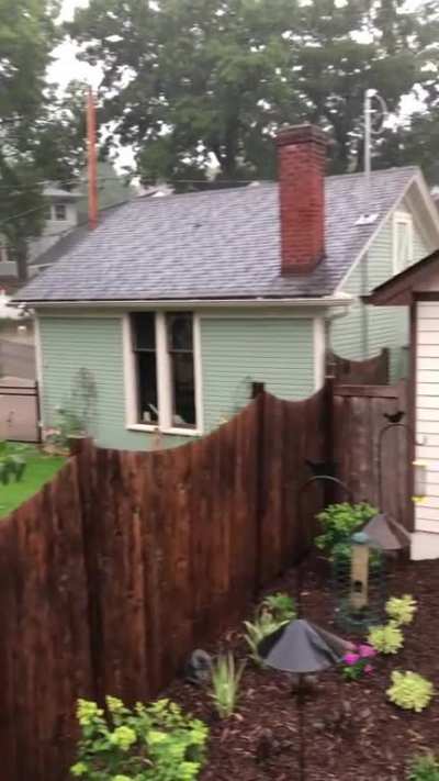 Midsummer downpour in Minneapolis, featuring my folks&rsquo; rain chain