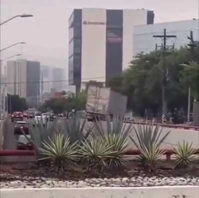 Truck does an backslide rockslide