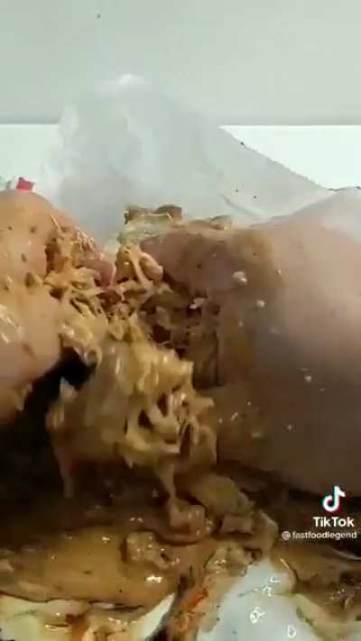 This guy tries to make a sandwich taste good with a lot of sauces