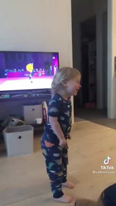 Little girl watches Olympics women&rsquo;s weightlifting