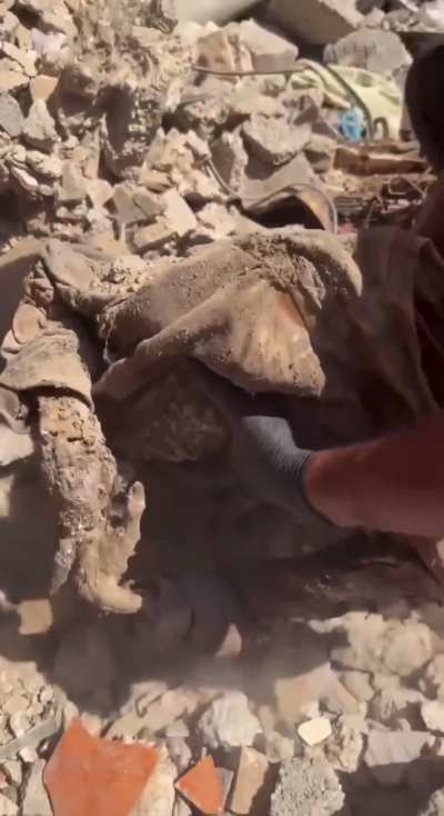 Israel wont let people into Gaza purely because they&rsquo;re going to find mass graves and thousands of bodies under rubble like this. This person had their hands on the back of their head