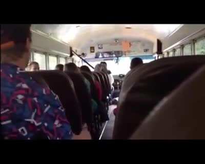 Kid stands up to bus driver