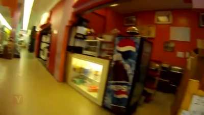 Mall cop tases woman after she refused to back it up.