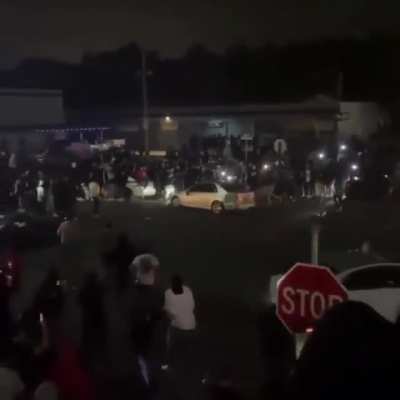 Car knocks down spectators at Cali doughnut competition, offender tries to escape