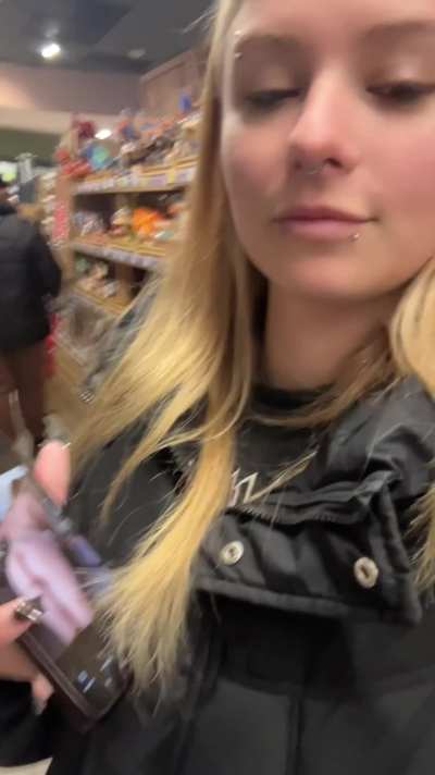 The store is a great place to show off my nude photos, it's just a shame that the men behind me can't see them