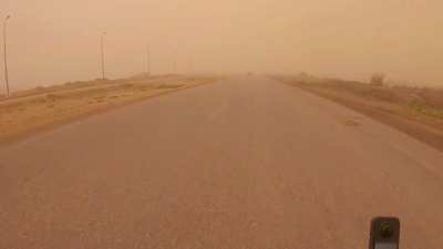 Caught in a sandstorm on motorbike
وسط عاصفة رملية بالموتسيكل