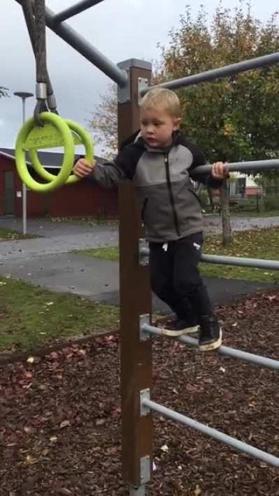 So, this is my son trying to hang in the rings...