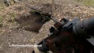 Foreign volunteers fighting as part of the International Legion of the Ukrainian Armed Forces after storming Russian positions take some Russian soldiers prisoner. The exact date and location are unknown.