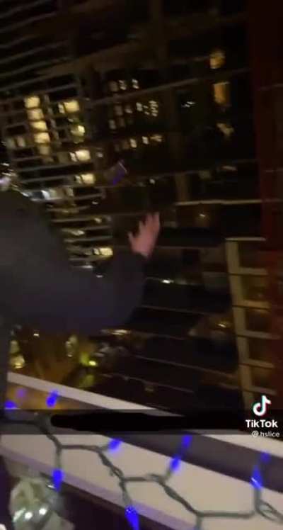 Doing tricks with your phone over a balcony. (I know it&rsquo;s a TikTok but this belonged here)