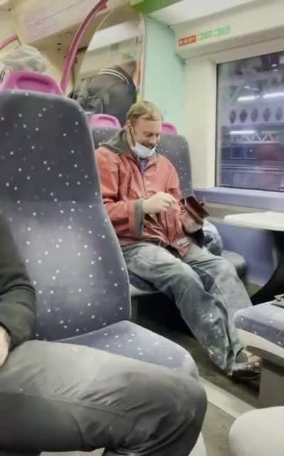 Bloke dosen't have his earphones plugged in.