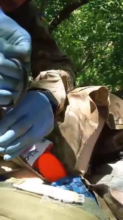 "Such pants were..." During an engineering reconnaissance mission, the SDF men of Azov exploded on a tripwire and sustained shrapnel wounds. The footage shows the professional work of a paramedic and the execution of a difficult but successful evacuation.