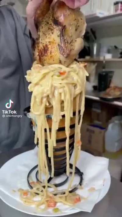 This "sandwich" with an entire roasted bird and covered in cheese sauce