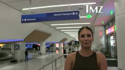 That Plane lady "TMFINR" is seen getting on another plane. Man asked what she saw that day.