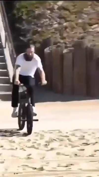 Absolutely nutty BMX 50-50 down massive stairset